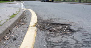 Potholes costing UK economy £14bn a year