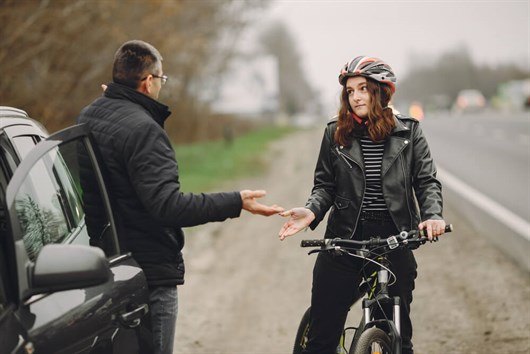 Driver And Cyclist