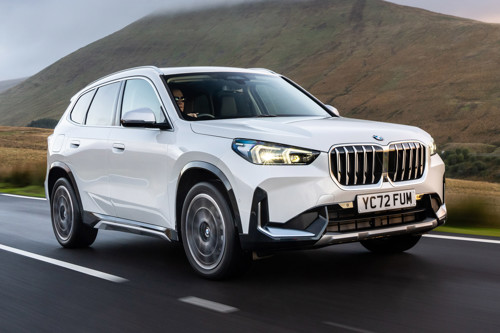 Best small luxury cars: BMW X1, white, driving