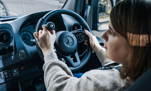 A typical adaptation to make driving more accessible - a steering wheel control ball