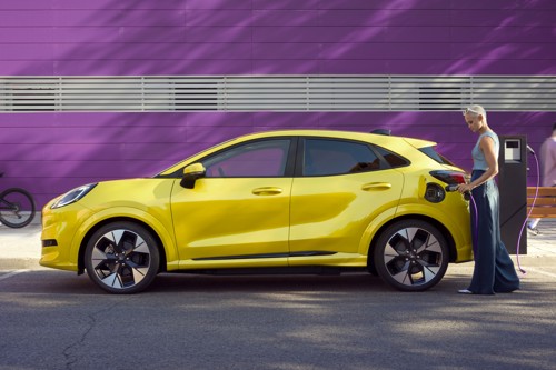 Best family cars 2026L Ford Puma Gen E 2024, profile view, yellow