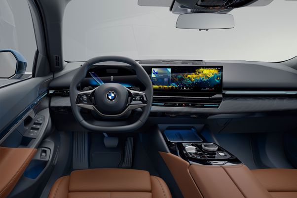BMW 5 Series Touring Review: left-hand drive dashboard from driver's perspective