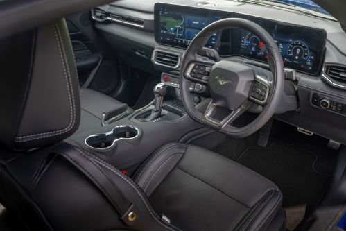 Ford Mustang Convertible Review: dashboard viewed from driver's door
