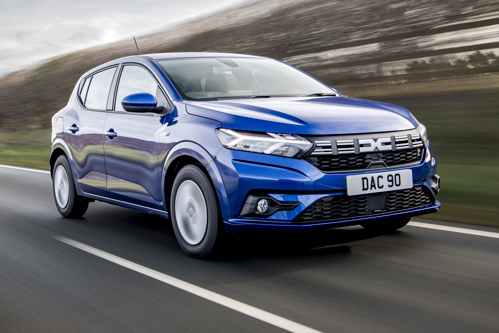 Best first cars 2025: Dacia Sandero Essential 90 TCE in blue, driving